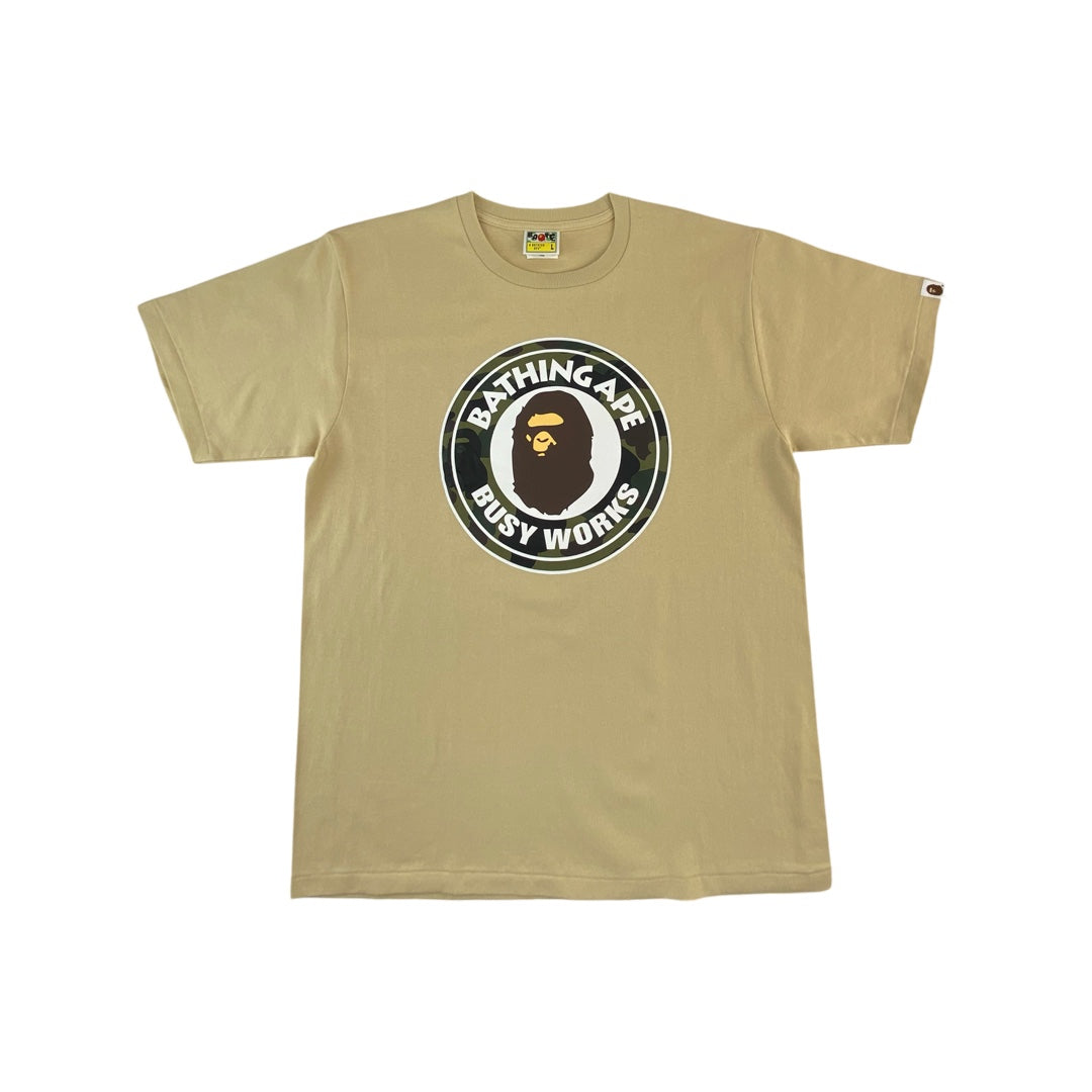 A Bathing Ape Tee "1st Camo Busy Works"-beigeDas Logo T-Shirt von A Bathing Ape. Details: Bathing Ape Logo Print, busy works Kurzarm, Rundhalsausschnitt beige